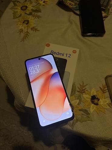 xiomi redmi 9 t: Redmi 12, 128 GB, rəng - Qara, İki sim kartlı — 1