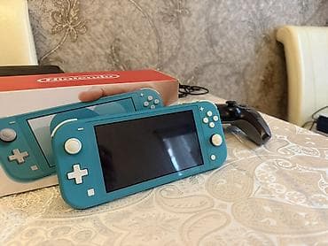 oyun qulaqciqi: Nintendo Switch Lite 
İdeal vəziyyətdə
Üstündə 128 gb yaddaş kartı — 4