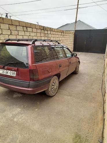 niva baqaj: Opel Astra F Caravan (universal) – qırmızı rəng - Kuzov: universal — 3