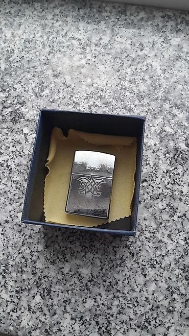 martin leon parfum: Məhsul: Zippo benzinli alışqan Təsvir: - Orijinal Zippo, alt hissədə — 5