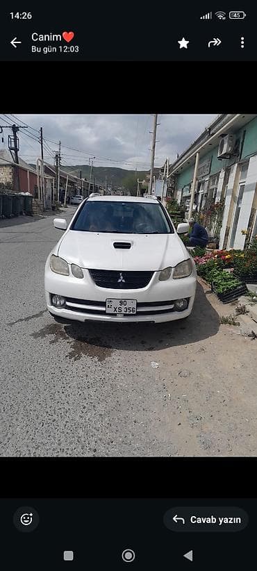 teziq olcen aparat: Mitsubishi Airtrek (Japan istehsalı) – ağ rəngli, tam ölçülü universal — 1