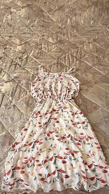 Qadın yay paltarı - Model: nazik askılı, yüngül və sallanan siluet -