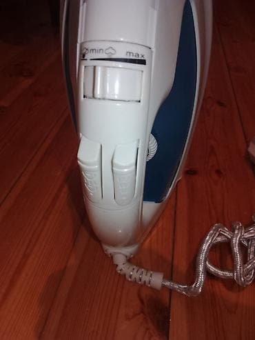 Buxarlı ütü – SOMANS TP-2302 Xüsusiyyətlər: - Buxar funksiyası