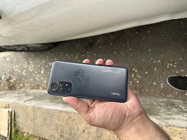 Xiaomi Redmi smartfon - Model: Redmi (arka qapaqda “Redmi” loqosu və — 2