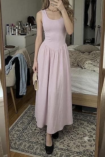 Şəxsi əşyalar: Məhsul: Pudra-çəhrayı rəngdə uzun, qolsuz don - Stil: Minimalist və — 1