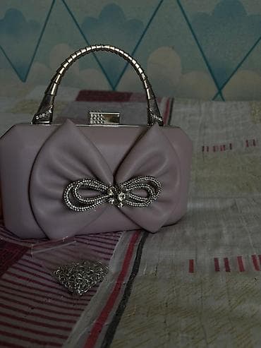 qaşlı çanta: Klatç, Yeni — 1