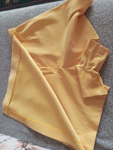 idman kişi şortları: Sarı rəngli skort (şort-ətək) 
Razmer S-M
Geyinilməyib — 2