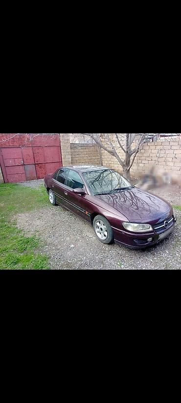 07 satsi: Opel Omega: 2 l | 1994 il 348520 km Sedan — 5