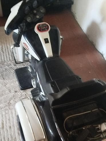 Uşaq üçün elektrikli üçtəkərli motosiklet - Rəng: ağ/qara - Korpus at lalafo.az Uşaq üçün elektrikli üçtəkərli motosiklet - Rəng: ağ/qara - Korpus