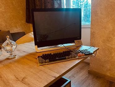 Bütün‑bir kompüter (All‑in‑One) monitor və sistem bloku bir korpusda — 1