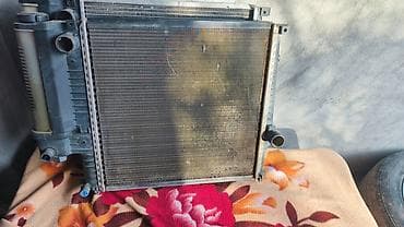 4 qapi niva: Bmw E34 radiyatır 
Radiyatır əla vəziyyətdədir heç bir problemi yoxdur — 1