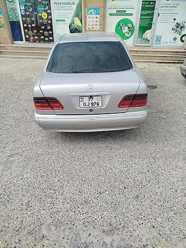 audi q5: Mercedes-Benz E-Class (W210) sedan - Kuzov: gümüş rəng, 4 qapı — 1