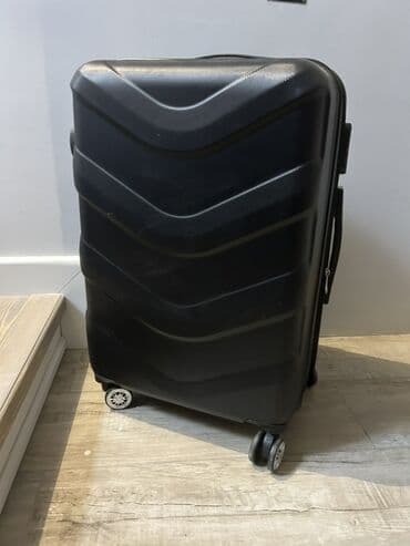 Qara rəngli, səyahət üçün nəzərdə tutulmuş Rokhbird baqajı. Yüngül və lalafo.az -da Qara rəngli, səyahət üçün nəzərdə tutulmuş Rokhbird baqajı. Yüngül və