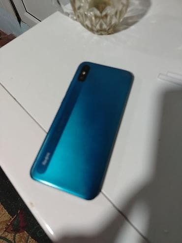 mini ats: Xiaomi Redmi smartfon - Rəng: mavi gövdə - Ekran: su damcısı formalı — 2