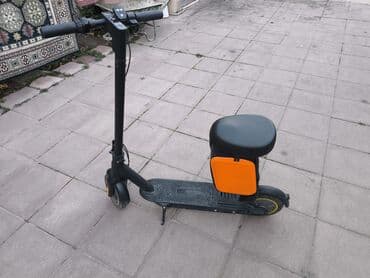 Elektrik skuter – oturacaqlı. Təkcə oturacağı 60 manatdir. Tekerlerin