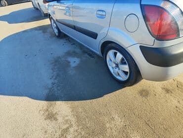 kia sportec: Kia Rio: 1.4 l | 2005 il Hetçbek — 2