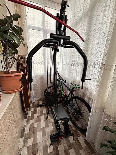 Çoxfunksiyalı trenajor — ev üçün güc və fitnes stansiyası real aliciya