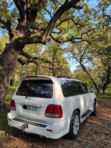 lalafo yumze traktor satisi: Toyota Land Cruiser 2002 – baxımlı, əziyyət görməyib. Ağ rəngdədir — 2