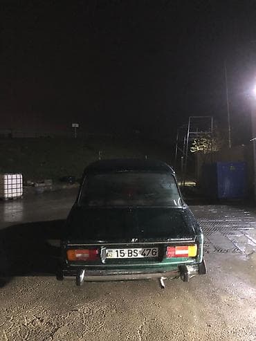 klass xl: VAZ 2106 sedan – klassik arxaötürməli model. Korpus tünd yaşıl/qaraya — 2