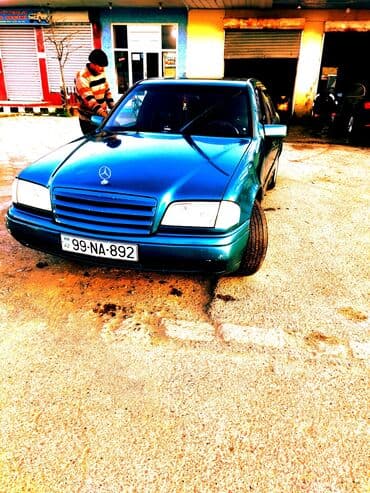 бампер на мерседес w210: Mercedes-Benz markalı, tünd firuzəyi rəngli sedan. Avtomobil rahat və — 1