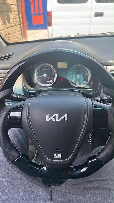 kia optima diskləri: Kia sükan çarxı və hava yastığı bloku - Orijinal Kia sükan çarxı, SRS — 1