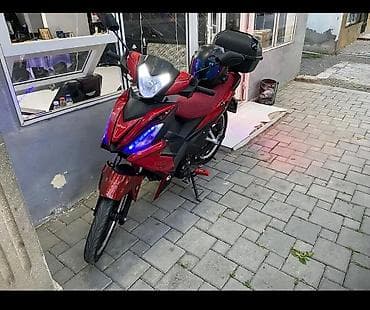 tap az matasklet: Moped/motosiklet – idman üslublu, qırmızı rəngdə, şəhər içi sürüşlər — 2