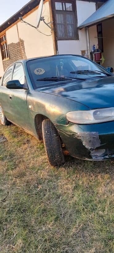 Скупка авто: Model: Daewoo Nubira (sedan) Rəng: Tünd yaşıl Yanacaq növü: Benzin — 7