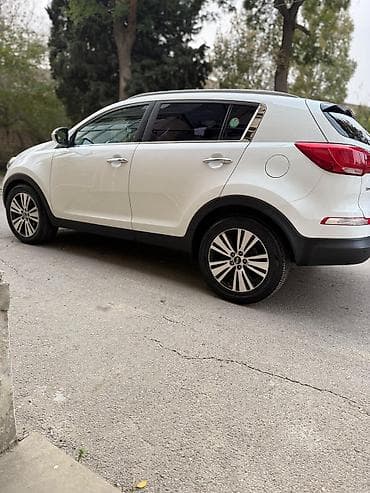 tesla disk: Kia Sportage, ağ rəng, kompakt krossover. Güclü və qənaətcil — 5