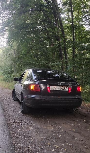 hyundai getz: Hyundai Elantra: 2 l | 2003 il Sedan — 3