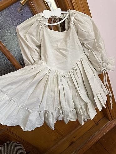 formasi: Uşaq paltarı – açıq krem rəngdə, romantik üslubda. - Model: qollu — 1