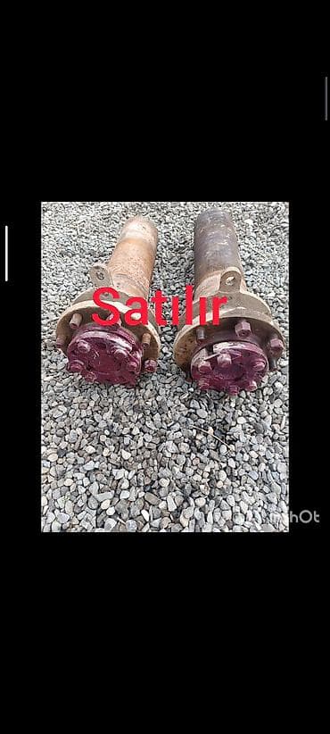 Satılır: qoşqu/yarımqoşqu üçün 2 ədəd təkər göbəyi ilə komplekt ox