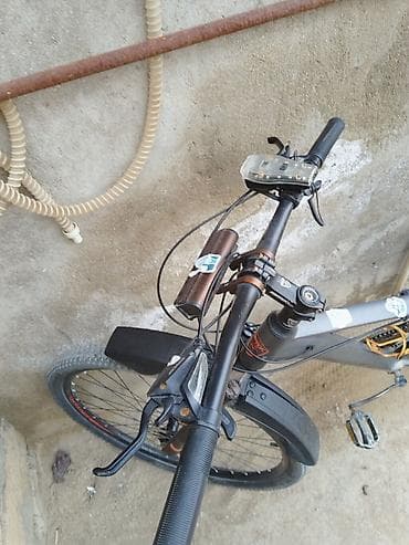 ucuz gitara: Velosiped – B’TWIN Rockrider GTR (MTB tipli) Xüsusiyyətlər: - — 1