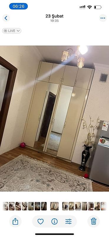 Altı qapılı, hündür tavanadək quraşdırılmış geniş dolab sistemi. - — 1