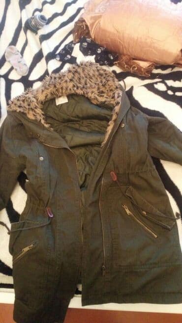 Kurtka, az geyinilib De Factodan alinib