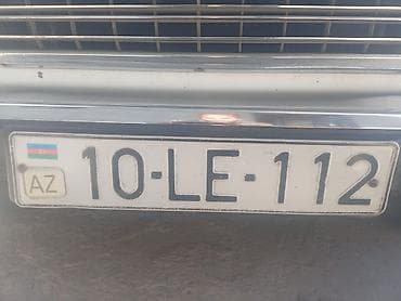 reno masin: Avtonömrə: 10-LE-112 Xüsusiyyətlər: - Azərbaycan dövlət nömrə nişanı — 1