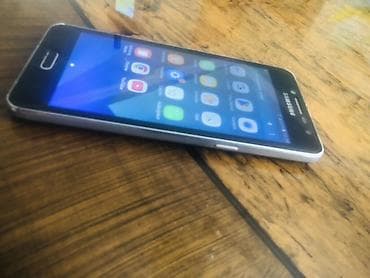 Техника и электроника: Samsung Galaxy J2 2016, цвет - Черный, Две SIM карты — 4