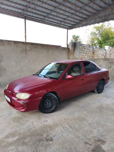 kia forte 2017: Kia Sephia: 1.6 l | 1998 il Sedan — 3