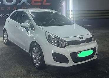 kia rio start stop: Kia Rio hatchback – ağ rəng, şəhər üçün ideal kompakt model. Texniki — 6