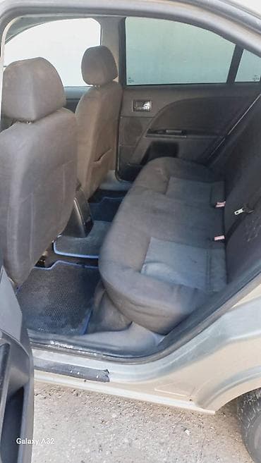 domkrat satilir: Ford Mondeo: 2 l | 2006 il 321000 km Sedan — 7