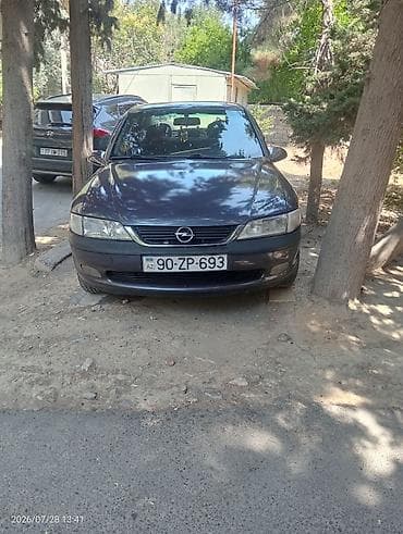 opel zapçast: Salam opel Vectra ili 97 mator 2 benzin tecili satılır barter yoxdu — 1