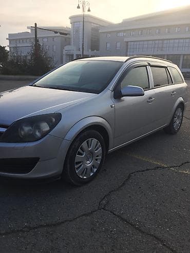 audi a4 ehtiyat hisseleri: Opel Astra Caravan (universal) – gümüşü rəng - Kuzov: universal — 7
