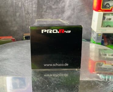 metbex tavan modelleri: Коллекционная модель Mercedes-Benz 200 W123 Hearse black 1982 Schuco — 5