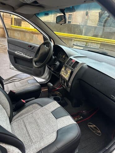 диски на 15 на ниву: Hyundai Getz, gümüşü rəng Texniki xüsusiyyətlər: - Yanacaq növü — 9