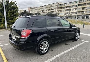 opel astra 2017: Opel Astra H Caravan (universal) – qara rəngdə, 5 qapılı şəhər və ailə — 6