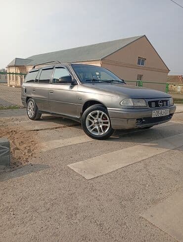 фольксваген джетта 6: Opel Astra Caravan (şunur kuzov) Xüsusiyyətlər: - Kuzov — 10