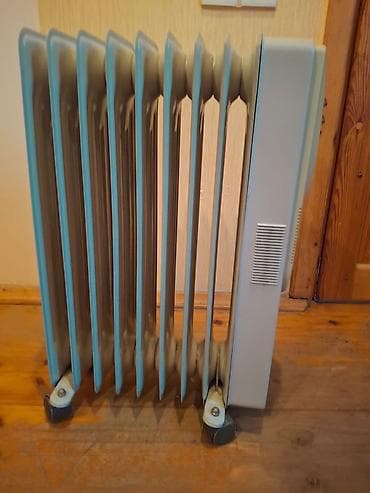 Elektrik yağlı radiator – 9 dilimli, təkərli model Toka taxanda