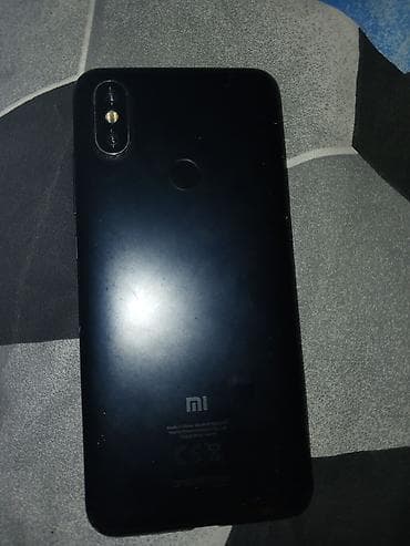 telofon ucuz: Xiaomi Mi A2, rəng - Qara, 
 Barmaq izi — 1
