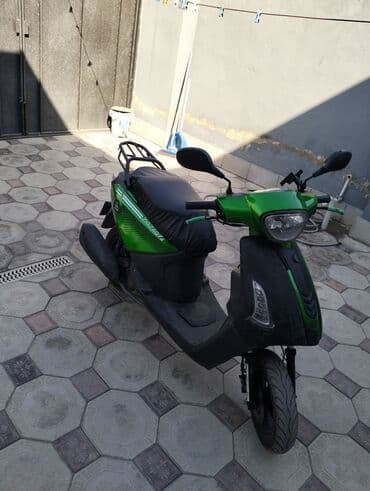 disk teker per page 40: Sarı rəngli şəhər skuterinə elan arxa baqajı da verilir üstün de - — 1