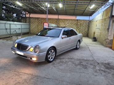 w210 kompressor: Mercedes-Benz E 220: 2.2 l | 2002 il Sedan — 5