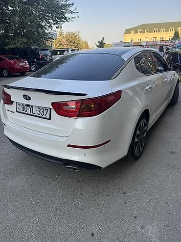 Avtomobil alışı: Kia Optima – ağ rəngdə, sedan kuzov. - Güclü və qənaətcil benzin — 6